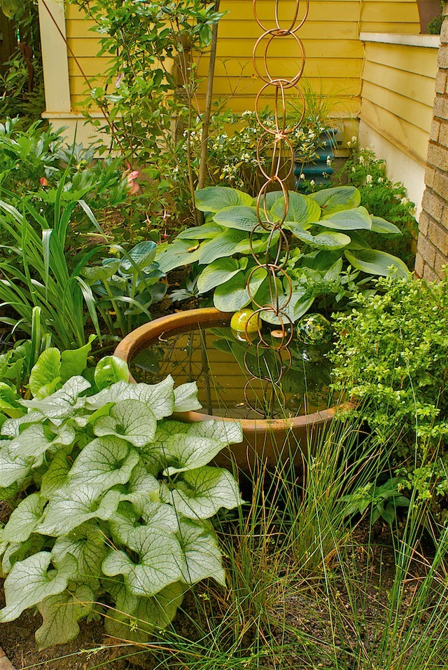 Revamp Your Outdoor Space with a Splash - Crafting the Perfect Garden with a Fountain